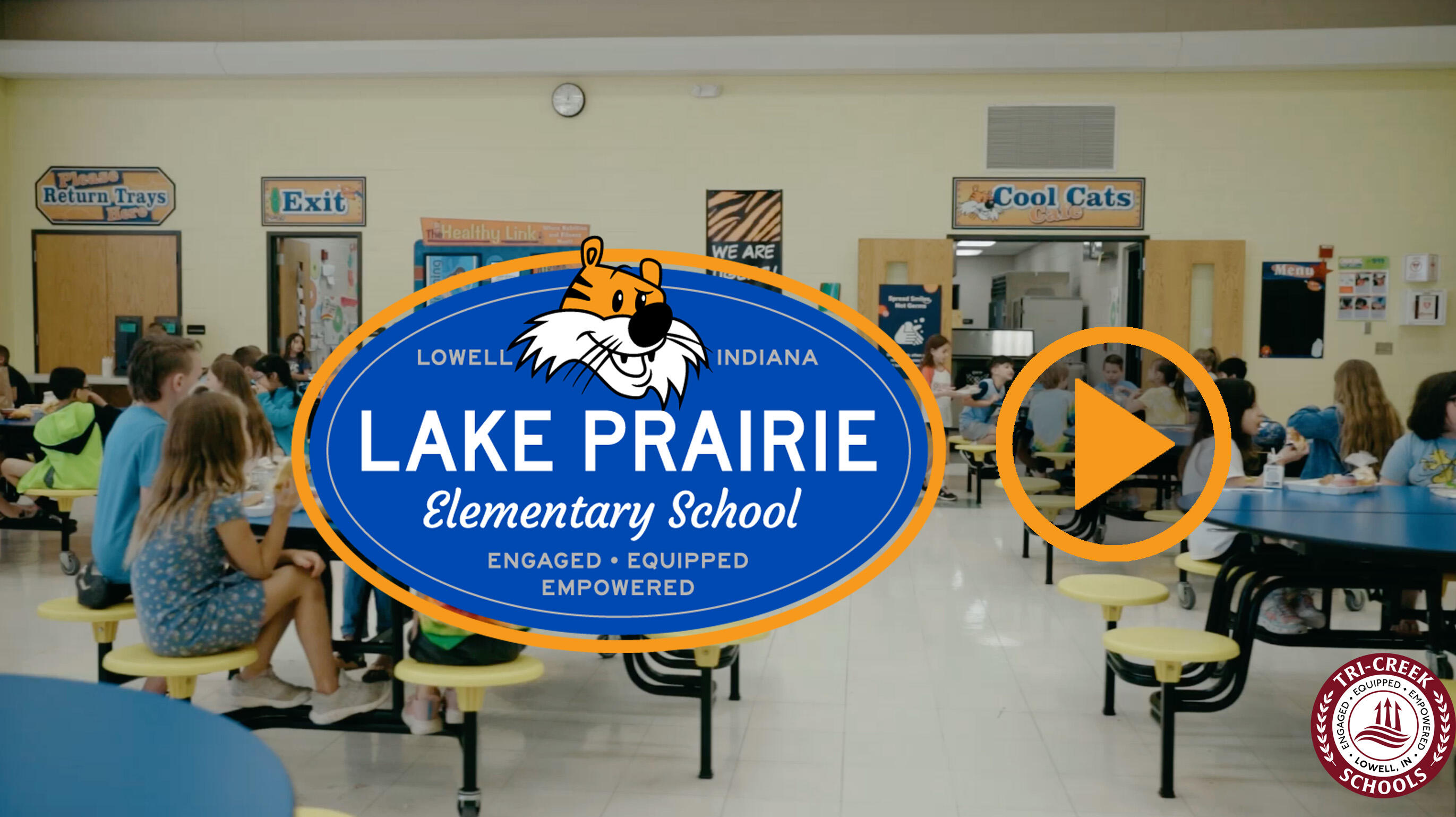 Lake Prairie Elementary School logo and students eating, click to view video