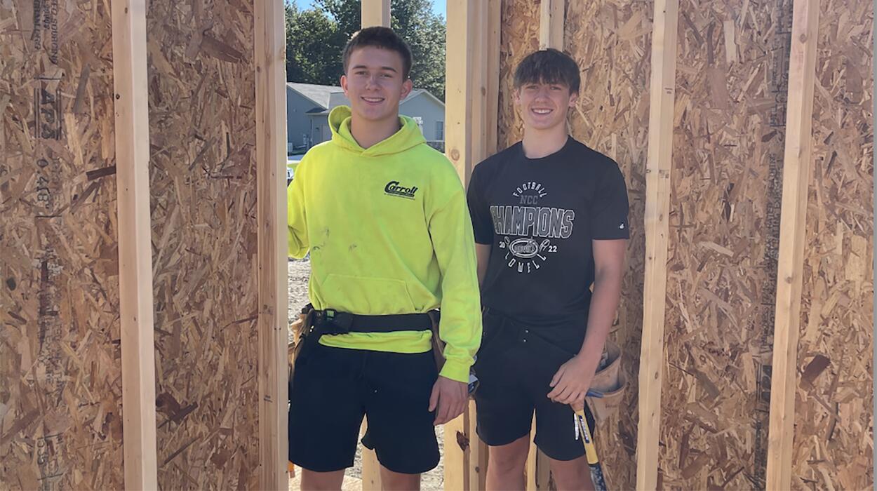 Students at the house construction site